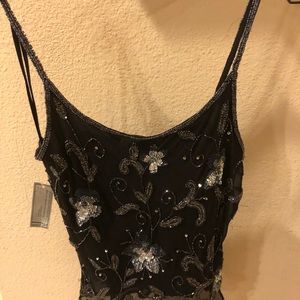 Brand new silk beaded top. Made in India.